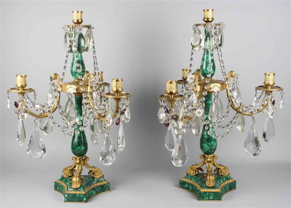 Appraisal: PAIR OF CONTINENTAL GILT BRONZE AND MALACHITE CANDELABRA each with