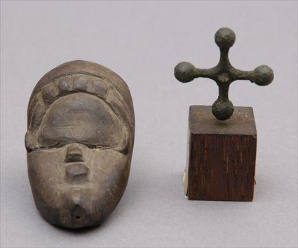 Appraisal: Bronze Cross and Small Wooden African Figure