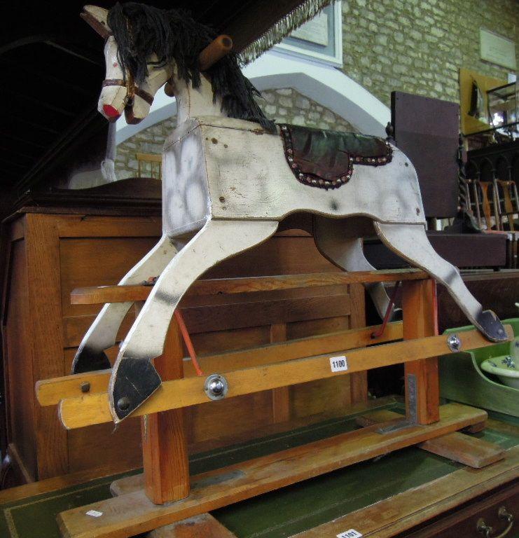 Appraisal: A 'Leeway' child's rocking horse with dappled painted finish raised