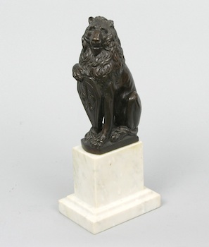 Appraisal: A Bronze Lion Sculpture with the Shield With its right