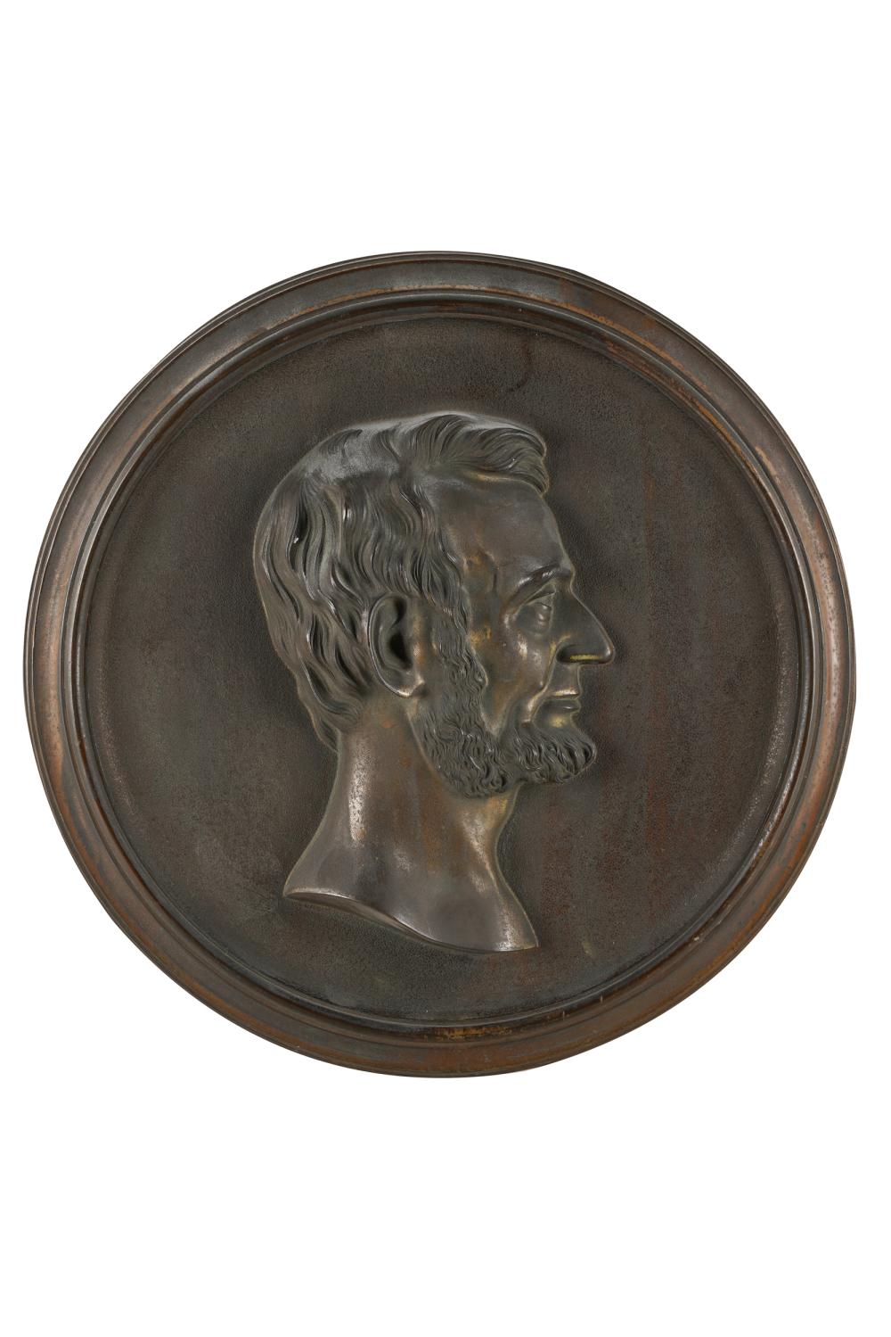 Appraisal: CAST METAL RELIEF PLAQUE OF ABRAHAM LINCOLNCondition appears intentionally distressed