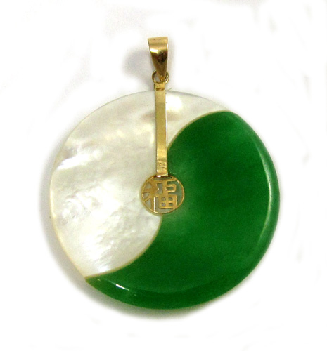 Appraisal: GREEN JADE AND MOTHER OF PEARL PENDANT IN FOURTEEN KARAT