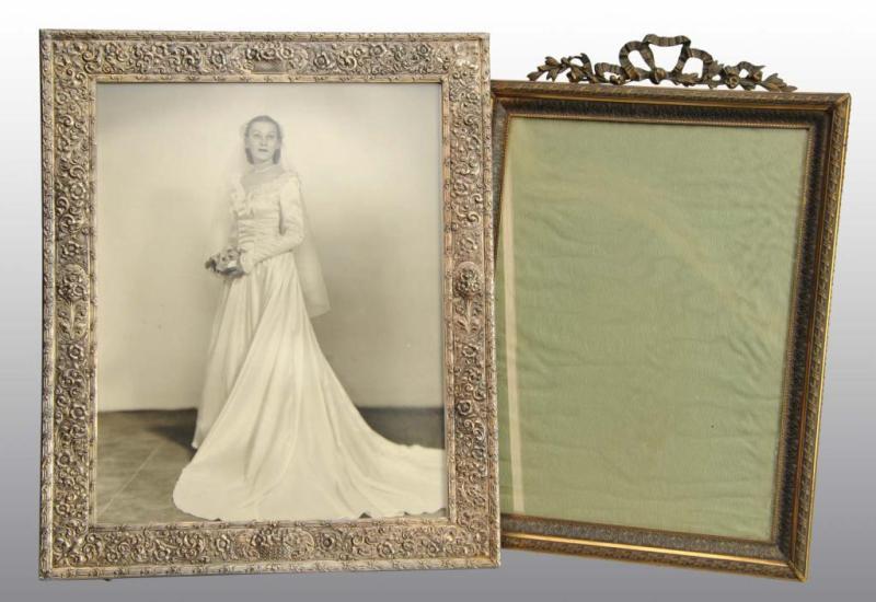 Appraisal: Lot of Picture Frames Description Includes one bronze frame and