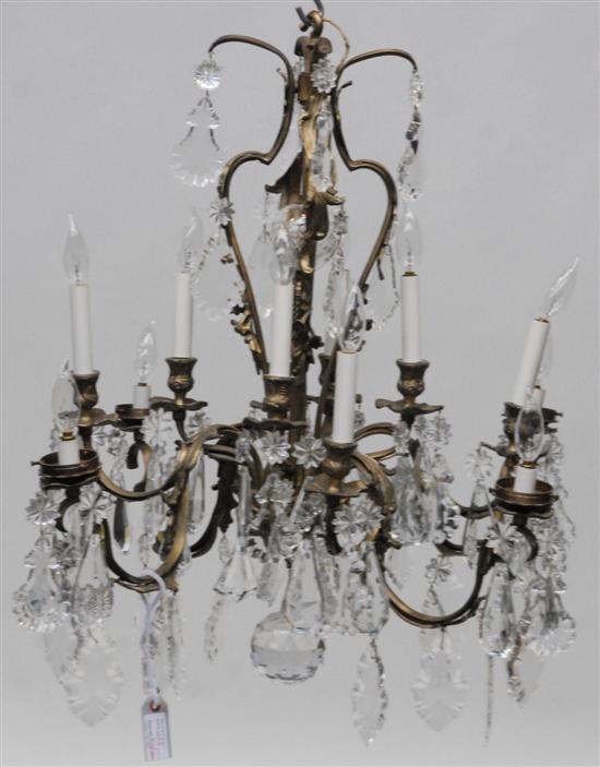 Appraisal: TWO-TIERED CHANDELIER light with scrolled support and arms crystal drops