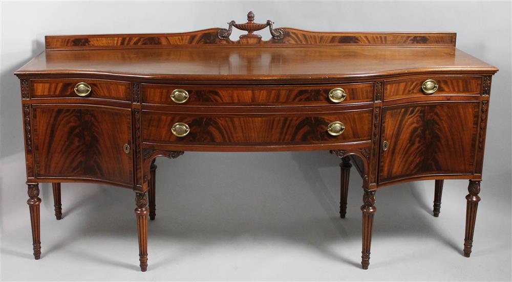 Appraisal: GEORGIAN STYLE CARVED AND INLAID MAHOGANY SIDEBOARD the sideboard having