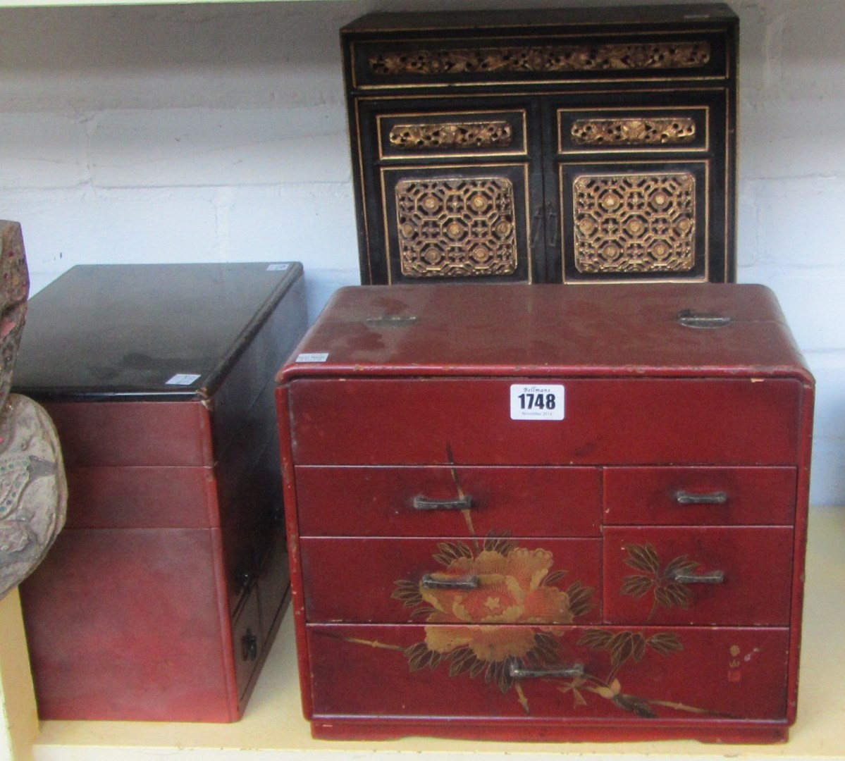 Appraisal: A Chinese gilt decorated ebonised wooden table cabinet th century