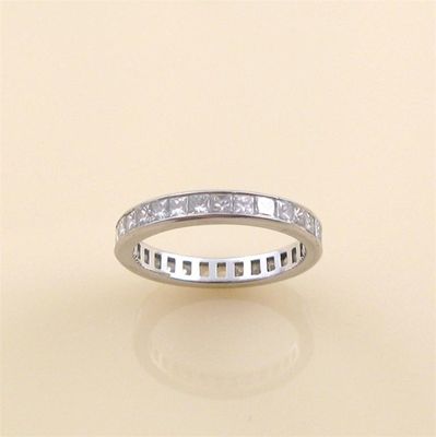 Appraisal: A diamond eternity ring set all round with princess cut