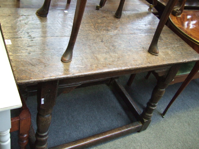 Appraisal: A th century and later oak table the plank top