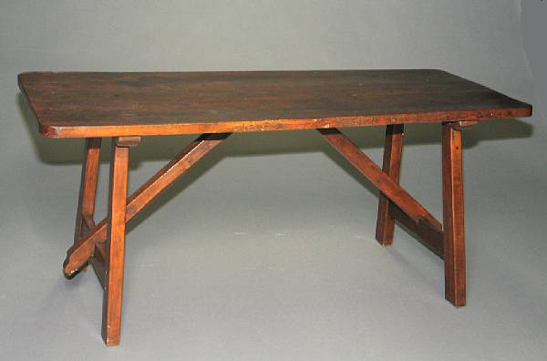 Appraisal: A Baroque style walnut trestle table mid th century height