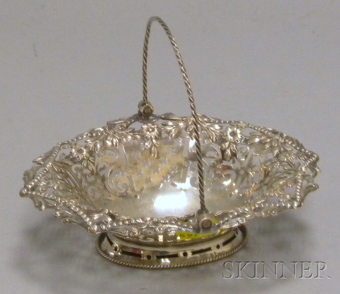 Appraisal: Small George III Reticulated Silver Sweetmeat Basket London oval with