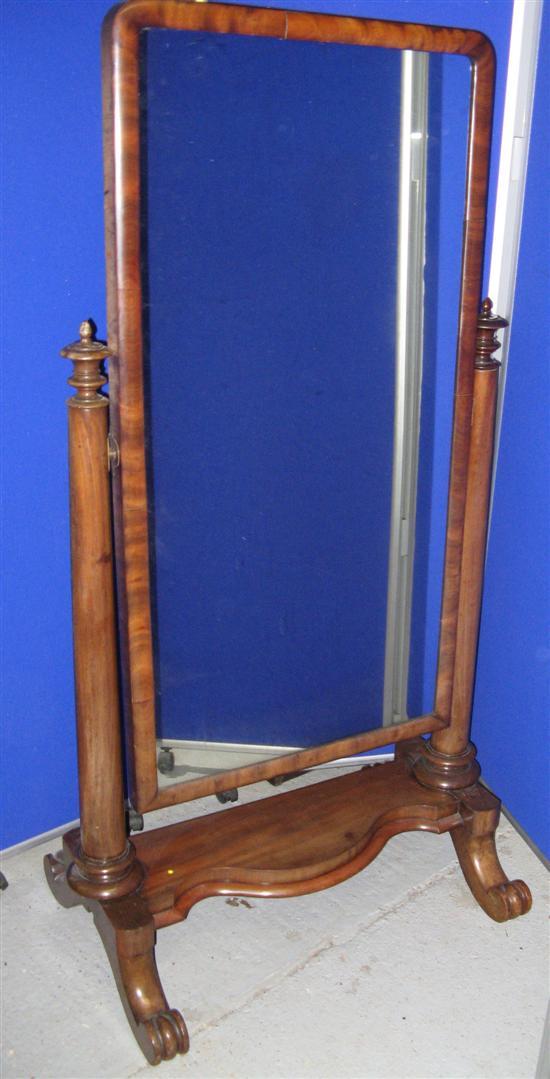 Appraisal: Victorian mahogany cheval mirror on turned column supports serpentine shaped