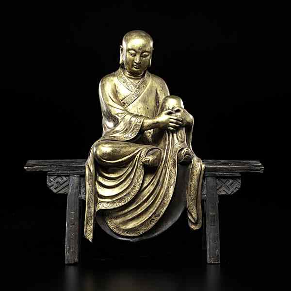 Appraisal: Bronze Lohan Chinese th century A gilt bronze lohan seated