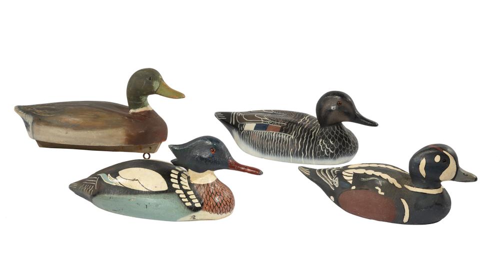 Appraisal: Four Carved Wood Duck Decoys th c incl common merganser