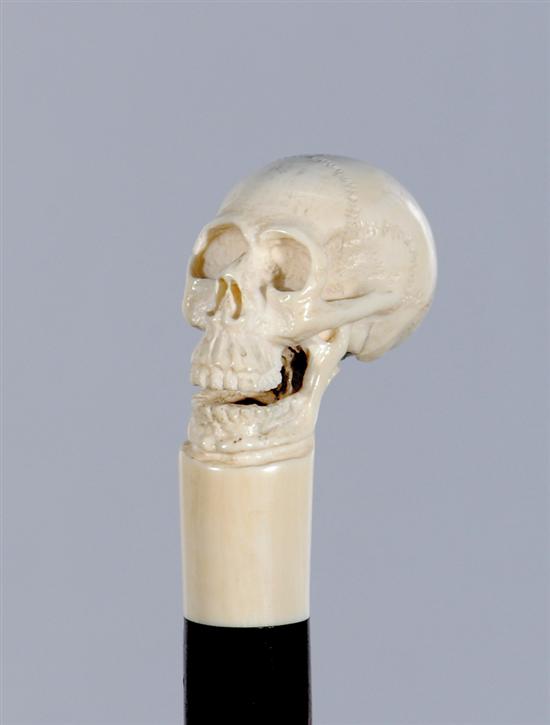 Appraisal: Rare carved ivory physician's cane th century ivory carved skull