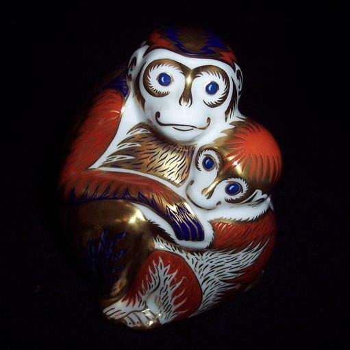 Appraisal: A Royal Crown Derby paperweight two monkeys date code LV