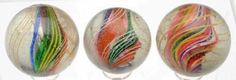 Appraisal: Lot of Divided Core Swirl Marbles Includes three multicolored divided