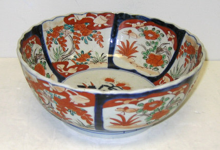 Appraisal: JAPANESE IMARI PORCELAIN BOWL Slightly lobbed body with shaped rim