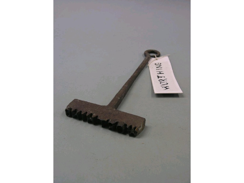 Appraisal: A late th century cast branding iron Worthing used to