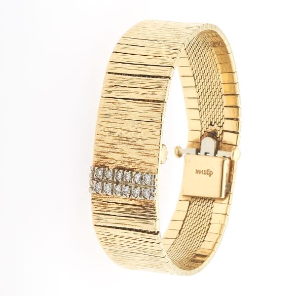 Appraisal: LADIES' BAUME MERCIER GOLD AND DIAMOND WATCH mm wide will