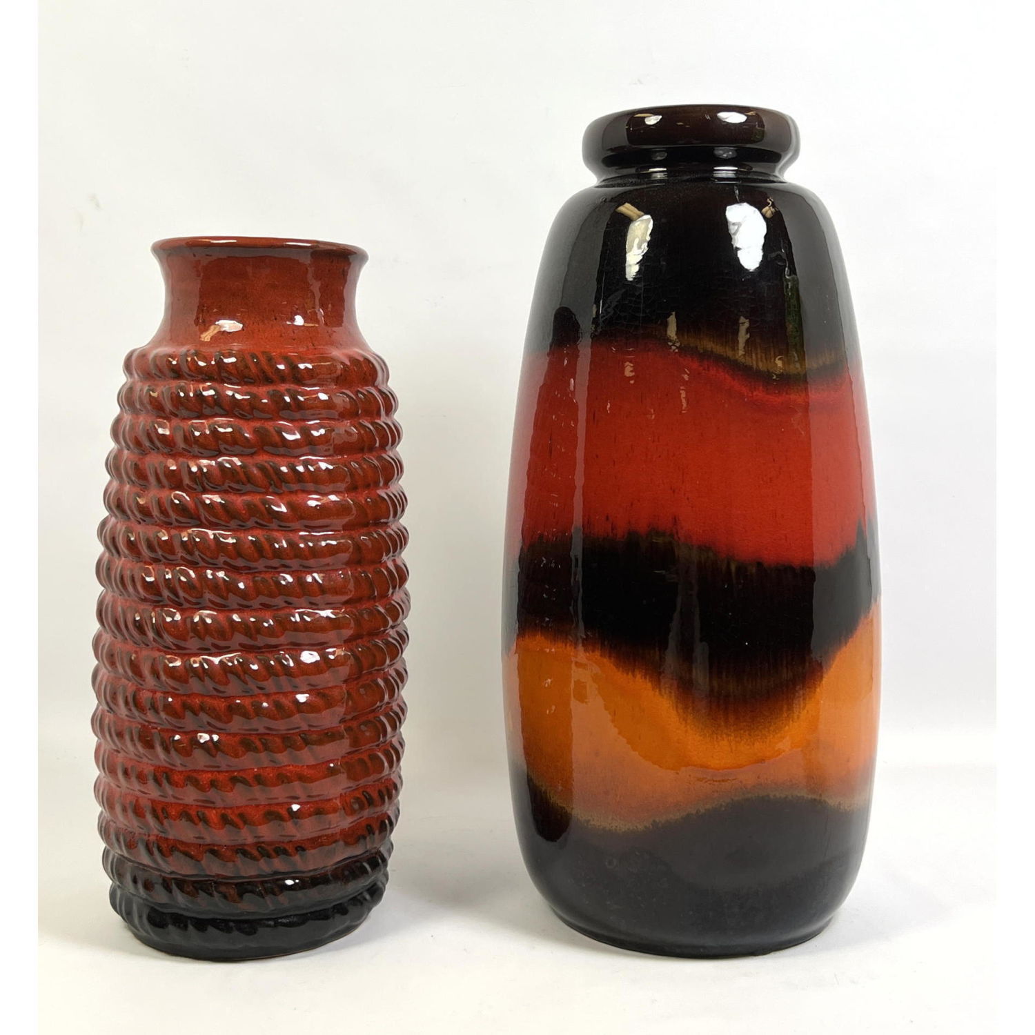 Appraisal: pc Glazed West German Pottery Vases Red glazed vase with