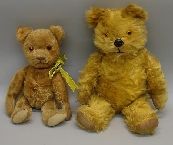 Appraisal: Pair of mohair bears Dark tan has brown glass eyes