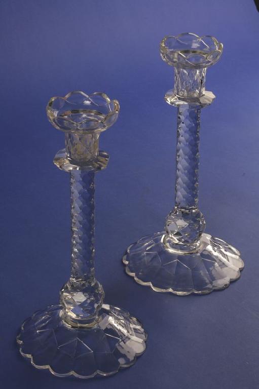 Appraisal: A PAIR OF GEORGE III CUT-GLASS CANDLESTICKS with integral sconces