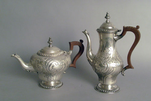 Appraisal: Georgian style sterling silver coffee pot h and teapot h