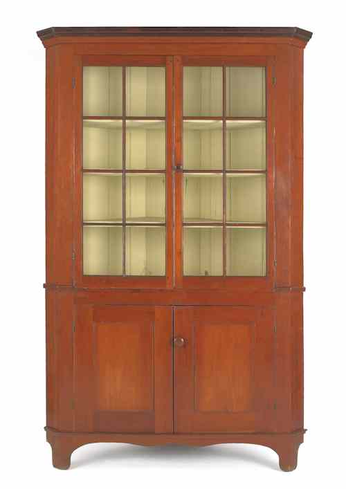 Appraisal: Pennsylvania two-part cherry corner cupboard ca h w