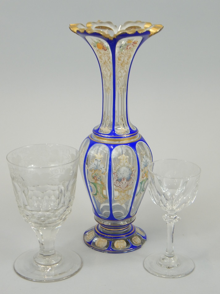 Appraisal: A Bohemian blue flash glass vase gilt decorated in coloured