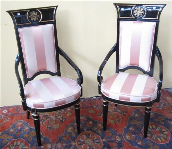 Appraisal: PAIR OF DIRECTOIRE STYLE BLACK AND GOLD PAINTED DINING ARMCHAIRS