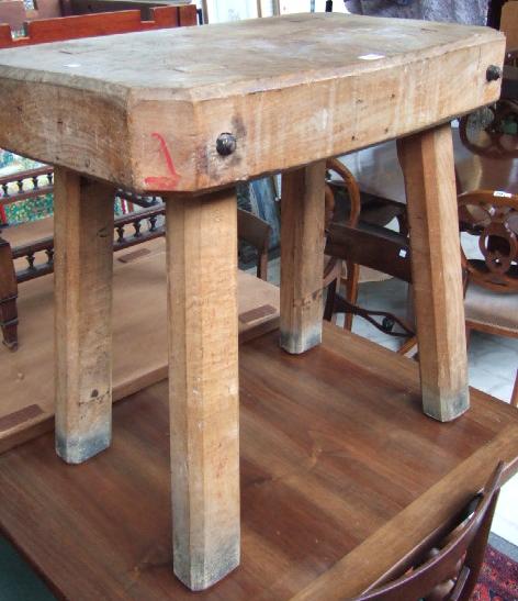 Appraisal: A th century elm chopping block the canted rectangular top