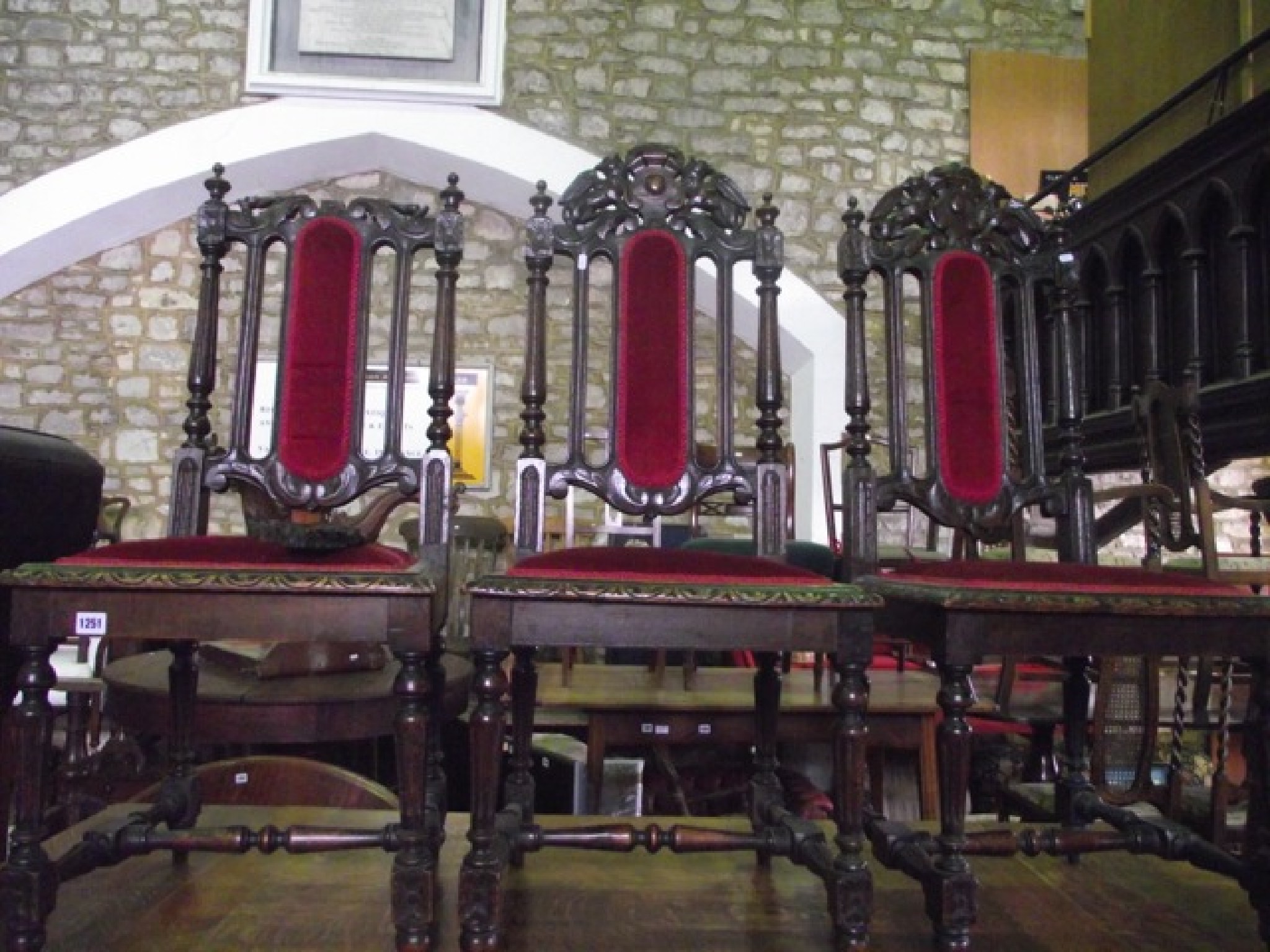 Appraisal: A set of four Victorian oak dining chairs with carved