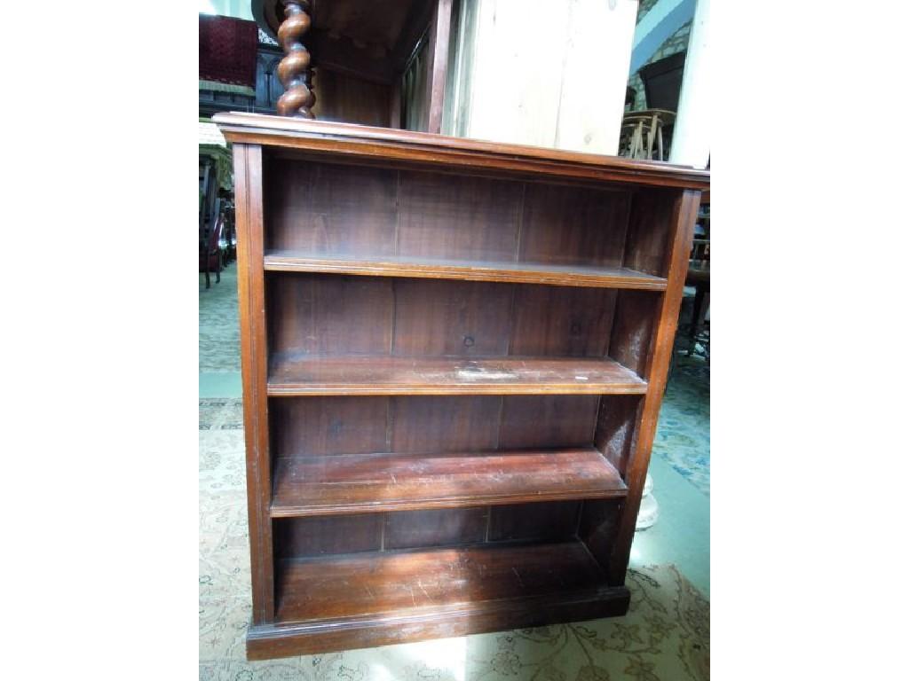 Appraisal: An Edwardian walnut freestanding open bookcase with three adjustable shelves