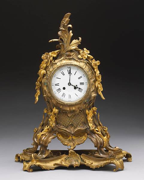 Appraisal: A Louis XV style gilt bronze mantel clock second half