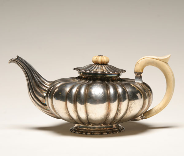 Appraisal: Austro-Hungarian silver teapot ribbed body and spout with gold wash