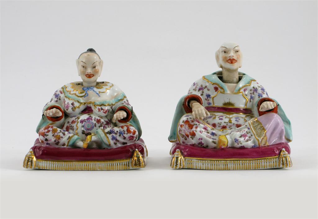 Appraisal: A pair of Continental porcelain pagoda figures