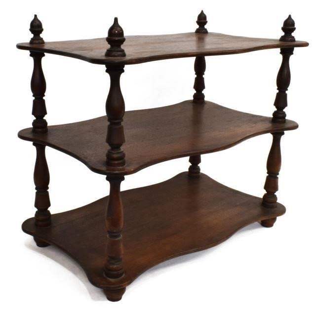 Appraisal: Diminutive etagere in dark finish featuring three shaped tiers on