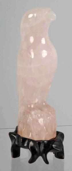 Appraisal: Carved Pink Quartz Eagle Description Includes teak wood stand Condition