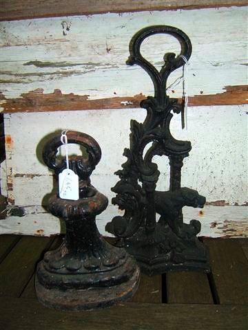 Appraisal: A Victorian cast iron black painted door stop in the