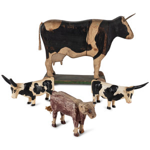 Appraisal: Four Carved Wood and Painted Folk Art Cows th th