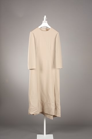 Appraisal: Unlabeled tan wool blend long sleeve asymmetric gabardine dress with