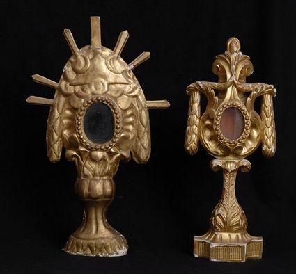 Appraisal: TWO ITALIAN NEOCLASSICAL CARVED GILTWOOD RELIQUARIES Each oval glass panel