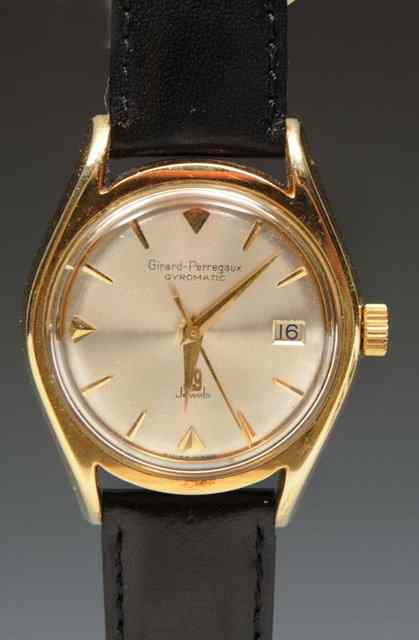 Appraisal: A GENTLEMAN'S WRIST WATCH in gilt case and leather strap