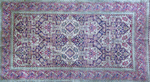 Appraisal: Silk Persian rug with an overall geometric pattern on a