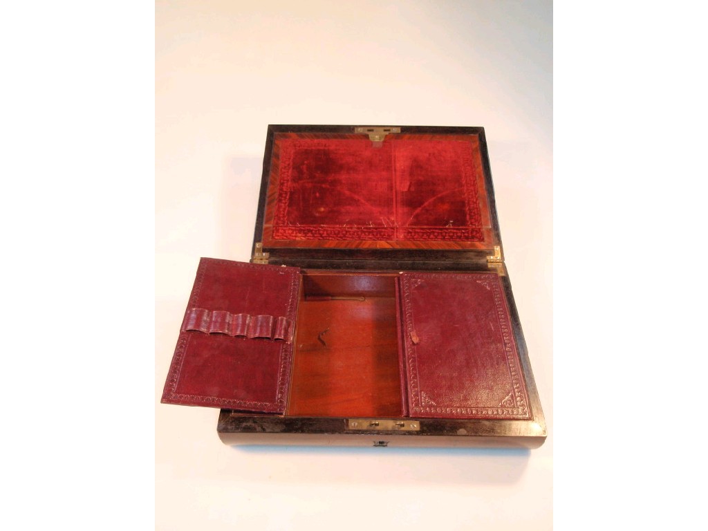 Appraisal: A thC rosewood writing box of rectangular form with rounded