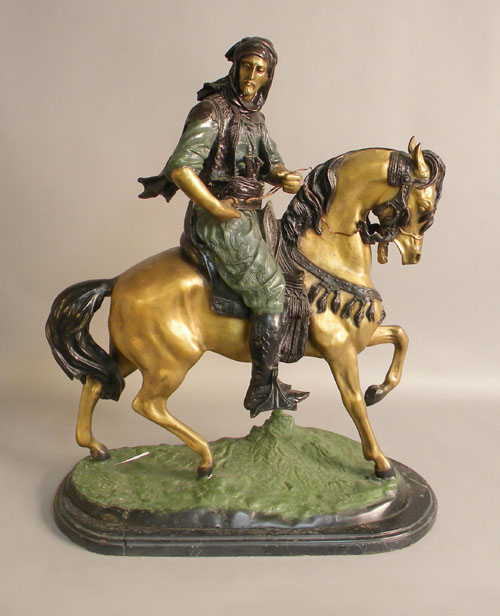 Appraisal: White metal figure of a horse and rider after Barye