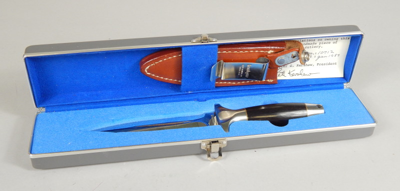 Appraisal: A Kershaw Trooper knife with scabbard in a fitted case