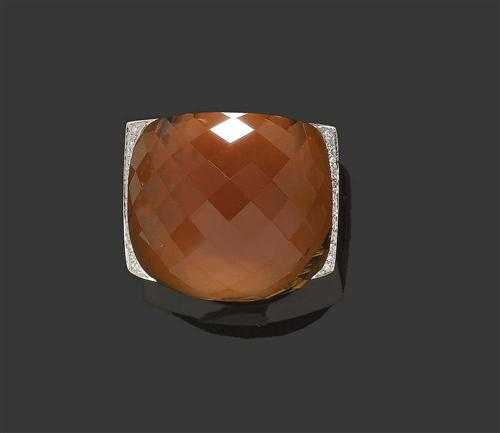 Appraisal: CITRINE AND BRILLIANT-CUT DIAMOND RING White gold Decorative large ring