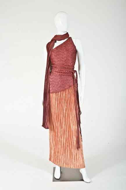 Appraisal: MARY MCFADDEN COUTURE MAUVE AND APRICOT FORTUNY EVENING ENSEMBLE s