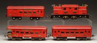 Appraisal: IVES STANDARD GAUGE ELECTRIC LOCOMOTIVE THREE PASSENGER CARS Loco is